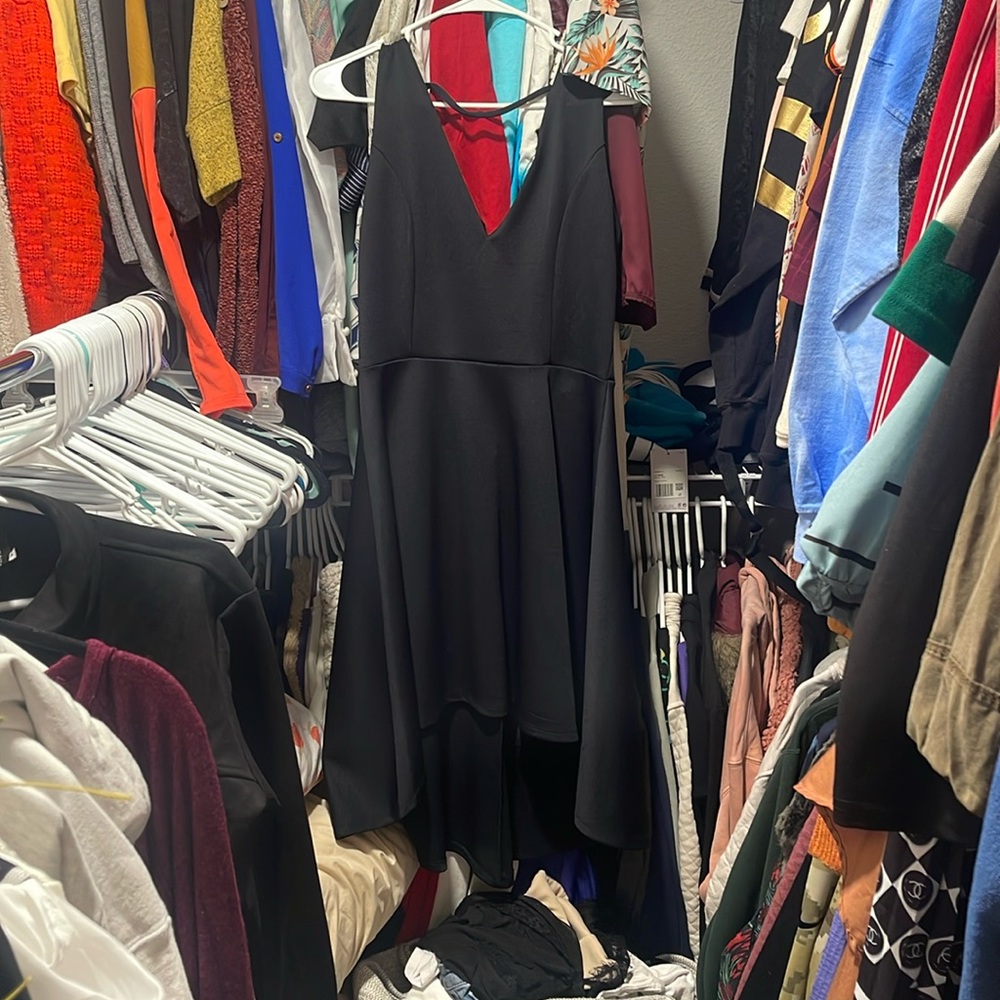 Revamped hi low black dress cut back